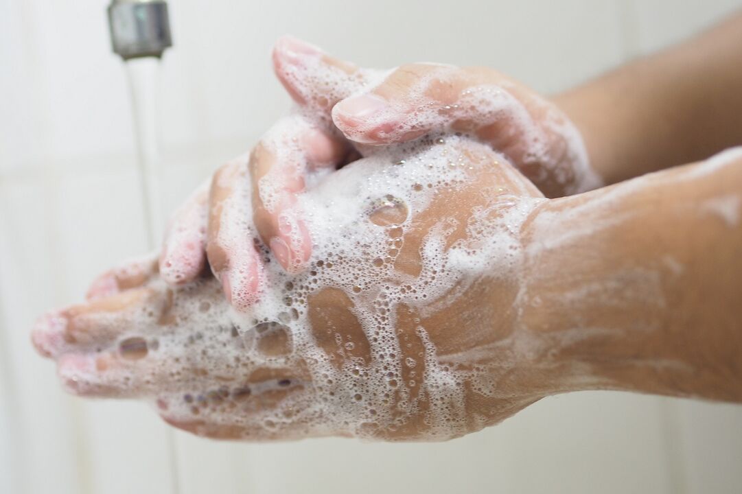 Washing hands with soap to prevent parasite infection